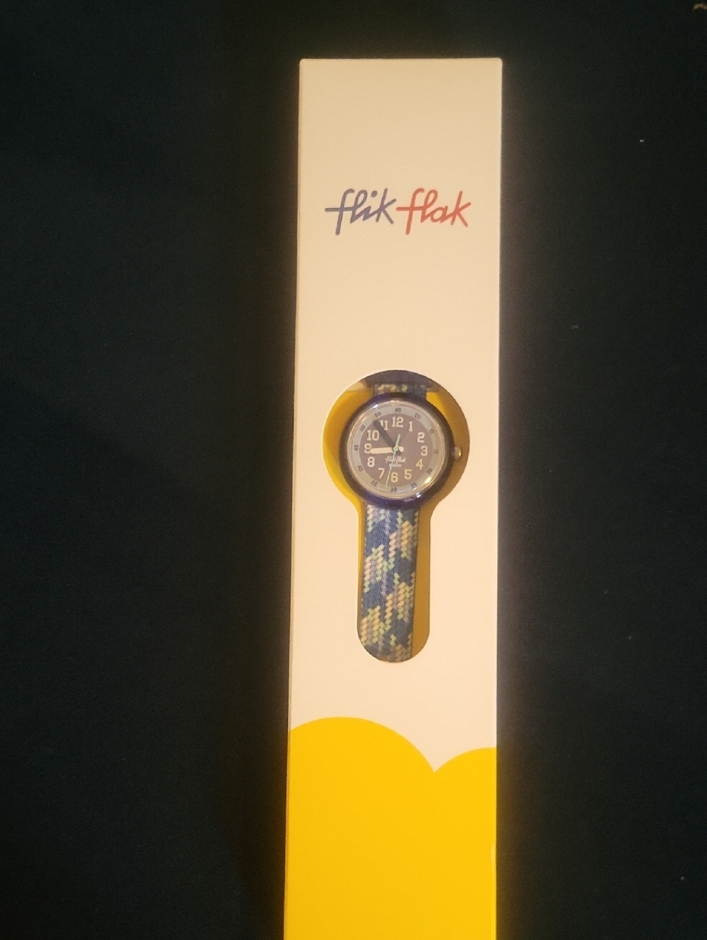 Flik Flak Watch Packaging - White with Blue & Red Logo
